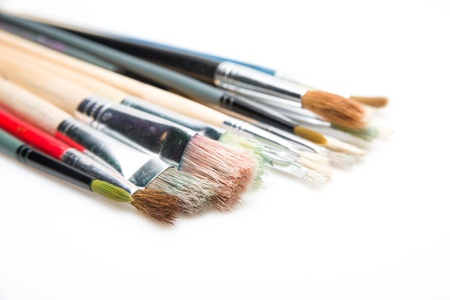 Image of paint brushes on white background with selective focusの写真素材