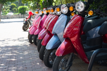 row of motorcycles on the streetの写真素材