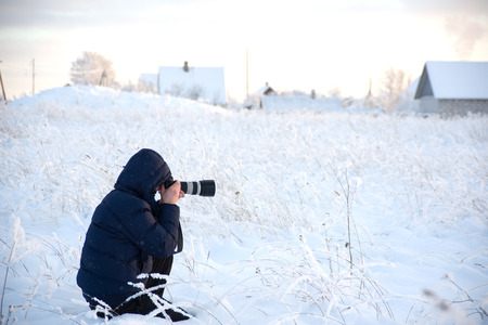 Image of Photographer in winter countrysideの写真素材