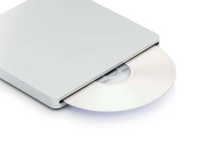 Image of grey external cd dvd burner reader isolated on whiteの写真素材