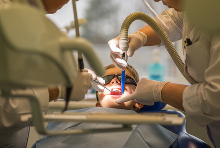 Image of Boy at the dentist with special lightingの写真素材