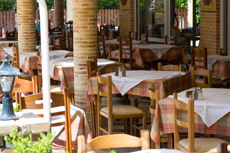 Image of Empty oudoor cafe tables with selective focusのeditorial素材