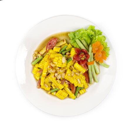 Corn salad in Thai spicy style healthy food Thai cuisine popular in Thailand decorate with carved vegetables top viewの写真素材