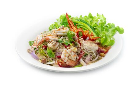 Spicy Salad Vermicelli Noodles with Shrimps and Minced Pork, vegetable, Hot Spicy Tasty Thai Food fusion style decorate carved cucumber, chili peppers and spring onion side viewの写真素材