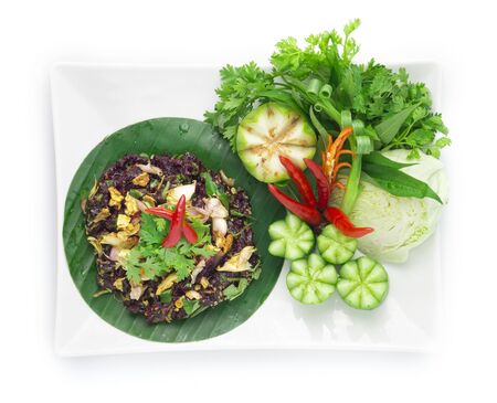 Spicy Raw Minced Pork Salad ingredient Spicy Herbs Thai Food Popular in Northern Style decorate with carved cucumber and vegetables top viewの写真素材