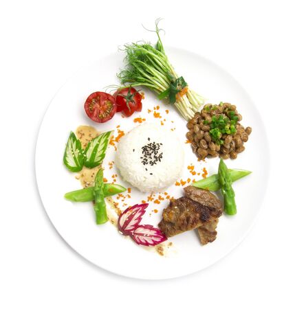 Natto with rice and grill pork Japan fusion style food healthy mini side dish decorate pea sprouts roll salad sasemi sauce  asparagus ,pickled cucumber and radish top view isolated on white backgroundの写真素材