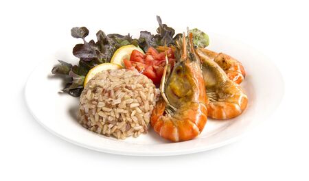 Brown Rice with Grill Shrimp healthy food cleanfood decorate carved tomato, lemon slice and leaf red Oak  side view isolated on white backgroundの写真素材