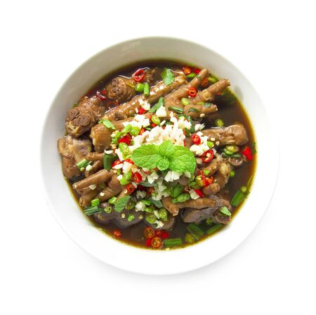 Chicken feet spicy soup Thai food spicy tasty style  top view isolated on white backgroundの写真素材
