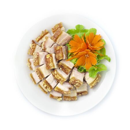 Crispy Pork (Crispy Belly Pork)Cutlet Asian Food dish Decorate vegetables snd carved carrot top viewの写真素材