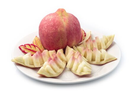 Peach Fresh Fruit Slice in carved style Popular of the world. Fruit Break time for diet vitamin C side viewの写真素材