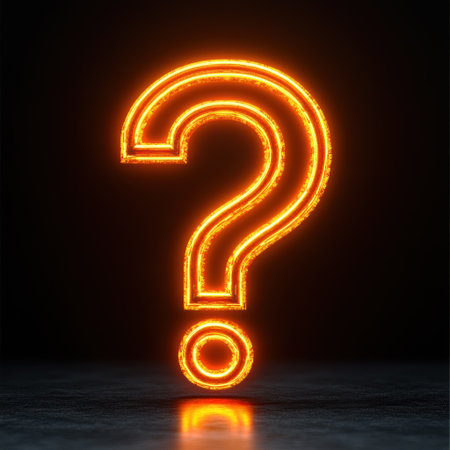 A bright orange question mark stands out against a dark background, sparking intrigue.の素材