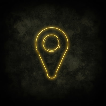 Neon map marker glows on a distressed background, enhancing the design.の素材