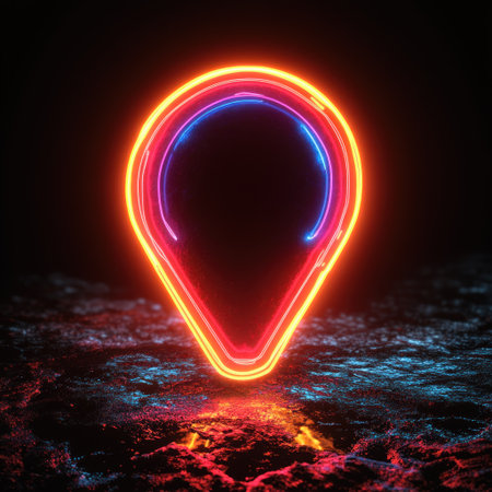 Bright neon location marker shines with vivid colors in a dark environment.の素材