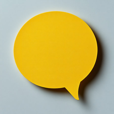 A bright yellow speech bubble sparks creativity and joyful conversations anywhere.の素材