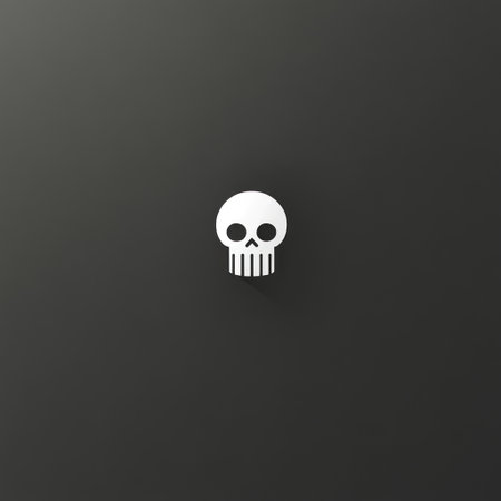 A simple yet striking skull design appears on a dark surface, creating a bold statement.の素材