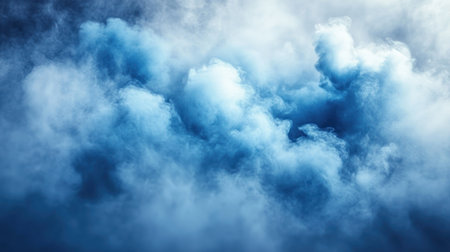 Fluffy blue clouds gather in a serene twilight sky, creating a tranquil atmosphere.の素材