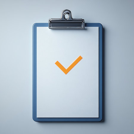 A minimalist clipboard shows a bright orange check mark, signaling success.の素材