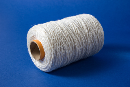 White thread isolated on white background. Rope, wool, knitting homemade handmade objectの写真素材