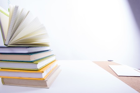 Stack of hadrback books. Library education concept. Back to school. Copy space.の写真素材