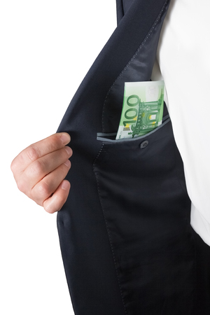 Businessman's hands counting money euro banknotes in the pocket.の写真素材