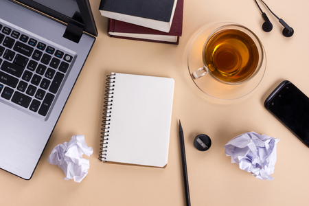 Office table with notepad, computer and coffee cup. Business creative consept.の写真素材