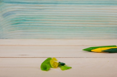 Back to school. Stack of colorful books on wooden table. Composition with vintage old hardback books, diary on wooden deck table. Books stacking. Copy Space. Education background.の写真素材