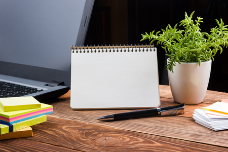 Office table with notepad, computer and coffee cup. Business creative consept.の写真素材