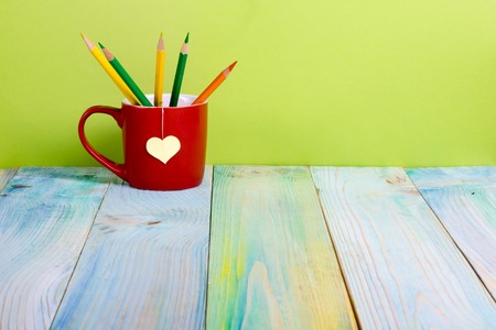 Vintage old books on wooden deck table and grunge background. Back to school.の写真素材