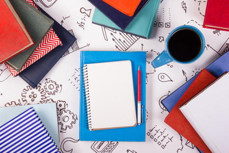Office table with notepad and coffee cup. Business creative consept.の写真素材