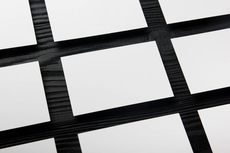 Business card blank on wooden background. Corporate Stationery, Branding Mock-up. Creative designer desk. Flat lay. Copy space for textの写真素材