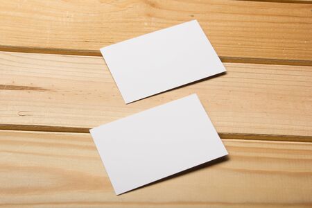 Business card blank on wooden background. Corporate Stationery, Branding Mock-up. Creative designer...