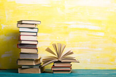 Books on wooden desk table and abstract background. Education background. Copy Space. Back to school.の写真素材