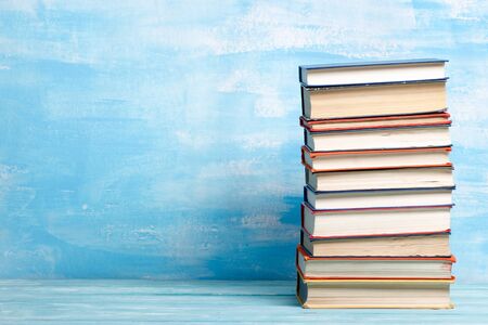 Books on wooden desk table and abstract background. Education background. Copy Space. Back to school.の写真素材