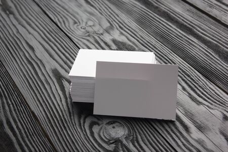 Business card blank on black wooden background. Corporate Stationery, Branding Mock-up. Creative...