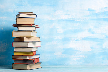Books on wooden desk table and abstract background. Education background. Copy Space. Back to school.の写真素材