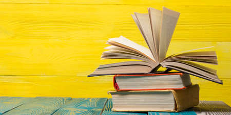 Books on wooden desk table and abstract background. Education background. Copy Space. Back to school.の写真素材
