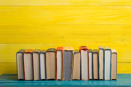 Books on wooden desk table and abstract background. Education background. Copy Space. Back to school.の写真素材