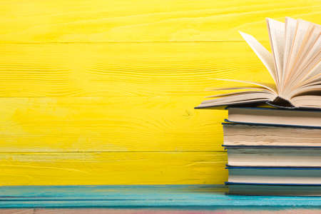 Books on wooden desk table and abstract background. Education background. Copy Space. Back to school.の写真素材