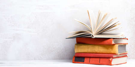 Books on wooden desk table and abstract background. Education background. Copy Space. Back to school.の写真素材