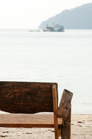 wooden chair at Surin island, Phangnga, Thailandの写真素材