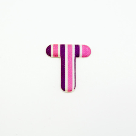 Letter T plastic sticker isolated on white backgroundの写真素材