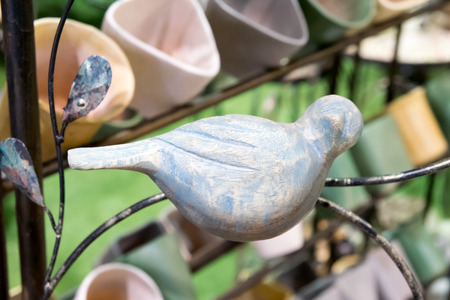 Wooden bird doll for home and garden decorationの写真素材