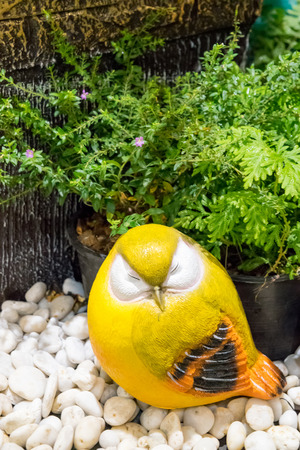 couple yellow birds ceramic for garden and home decorationの写真素材