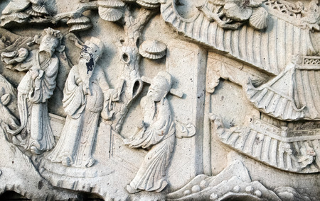 Chinese stucco art on a wallの写真素材