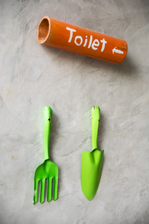 Steel hand cultivators suspended on the wallの写真素材