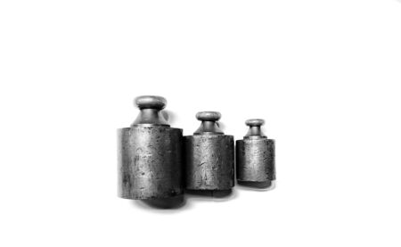 Aesthetic composition of Vintage brass weight, black and white photo.の写真素材