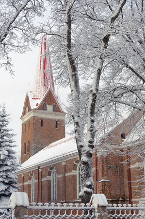 Church building in early winter morning. Breathe the air of Christmas spirit.の写真素材