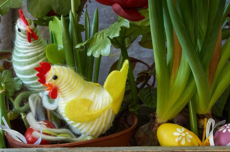 Easter decor box with chicken, rooster, painted eggs, natural and artificial flowers