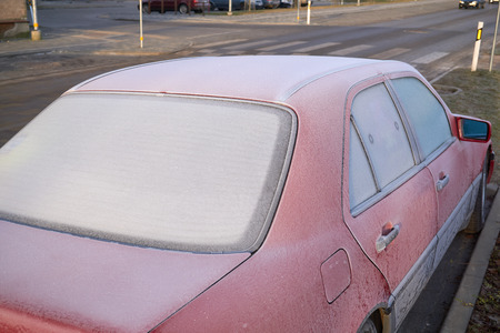 frozen windshield, car windows, cold winter morning, city streetの写真素材