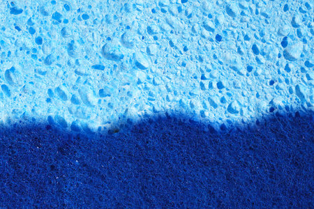 Blue Rippled Seam On Light Green Foam With Distinct Pore Texture And Soft Tonal Variation, Painterly...